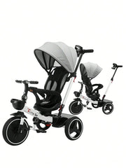 Baby tricycle with canopy on a white background