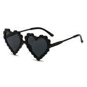 Gafas de sol elegantes y protectoras en forma de corazón para niñas