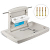 Beige pet grooming table with accessories on a white background