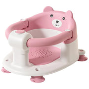 Pink bear-shaped children's seat with white base on a white background