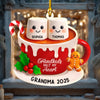 Personalized Christmas ornament with two smiling marshmallows in a mug, candy cane, gingerbread man, and 'Grandkids Melt My Heart' text.