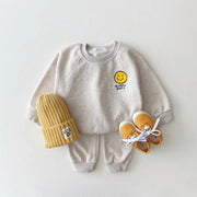 Conjunto de sudadera con capucha para bebé con cara sonriente 