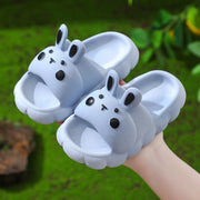 Lindas pantuflas de conejo de dibujos animados para niños