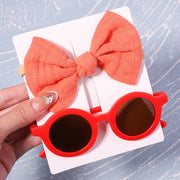 Lindo conjunto de gafas de sol y lazo de verano para bebés